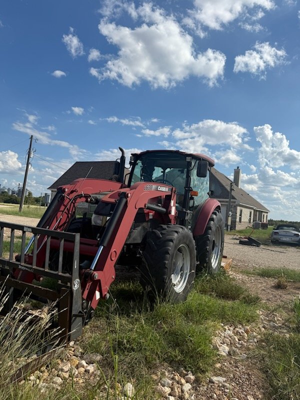 John F 2014 Case IH 115C